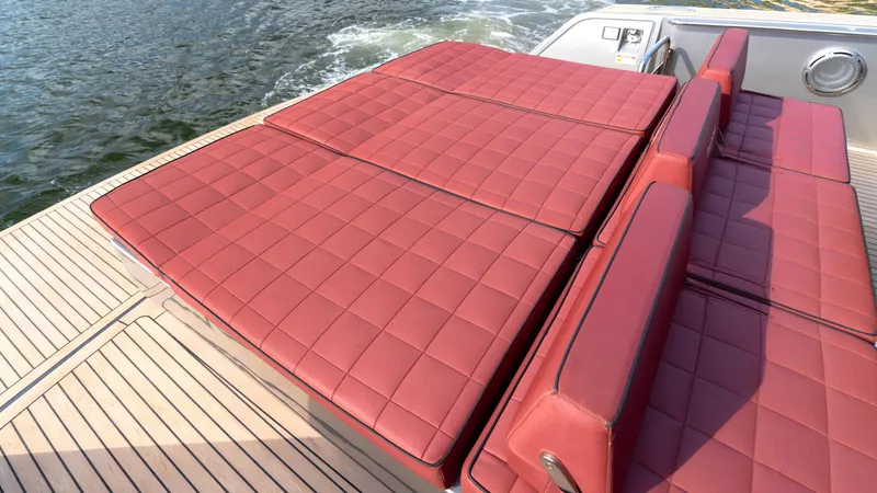 Slide: The Image of Luxurious red seating on 2022 Pardo Yachts Pardo 43, overlooking water. - 17