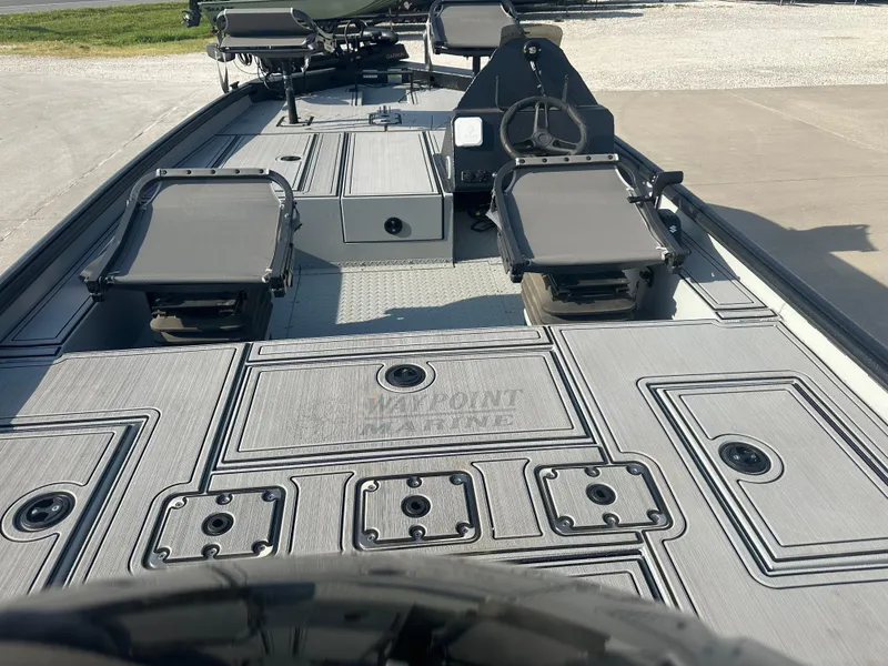 Slide: The Image of Garmin trolling motor on 2025 SeaArk Flex 19 boat, outdoor setting. - 4