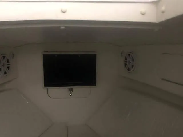 Slide: The Image of Interior of 2019 Midnight Express 39 Cuddy boat with TV and speakers. - 12