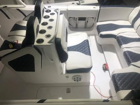 Slide: The Image of 2019 Midnight Express 39 Cuddy interior with luxurious seating and modern design. - 9