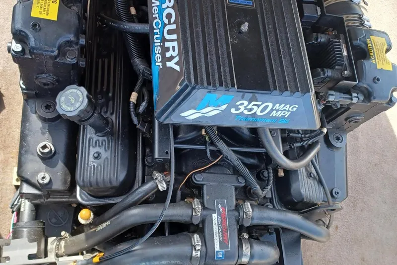 Slide: The Image of Mercury MerCruiser 350 MAG MPI engine in a 2001 Tigé 20ci boat. - 21