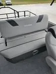 Slide: The Image of 2025 Sylvan L-3 DLZ boat interior with gray seating and modern design. - 9