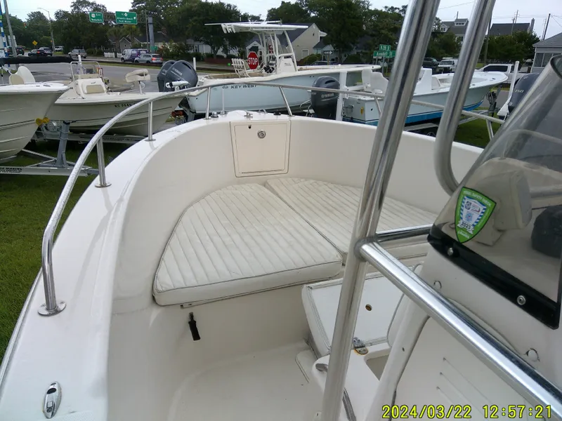 Slide: The Image of 2007 Cobia 214 CC boat on trailer at Grand Slam dealership. - 2