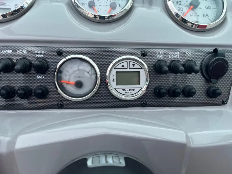 Slide: The Image of Dashboard of 2014 Chaparral 19 Sport H2O boat with gauges and controls. - 8