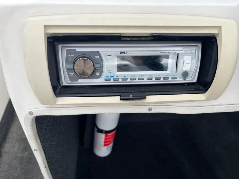 Slide: The Image of Pyle stereo system in 2004 Tigé 20V Limited Edition boat dashboard. - 19