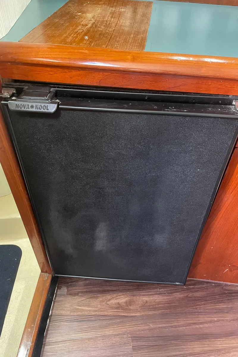Slide: The Image of Nova Kool refrigerator in 1992 Ocean Yachts Sport Cruiser interior. - 22