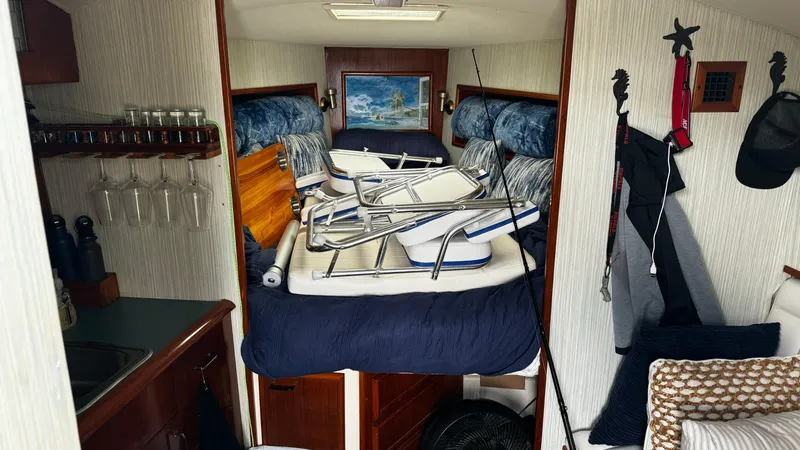 Slide: The Image of Interior of a 1992 Ocean Yachts Sport Cruiser with fishing gear and seating. - 4