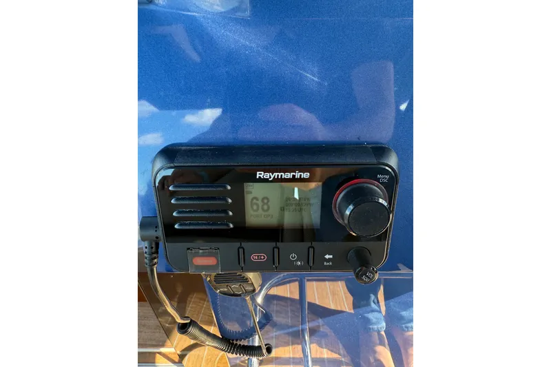 Slide: The Image of Raymarine marine radio on 2022 Tesoro T38 Outboard boat dashboard. - 36