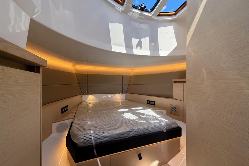 Slide: The Image of Luxurious interior cabin of 2022 Tesoro T38 Outboard with modern design and ambient lighting. - 48