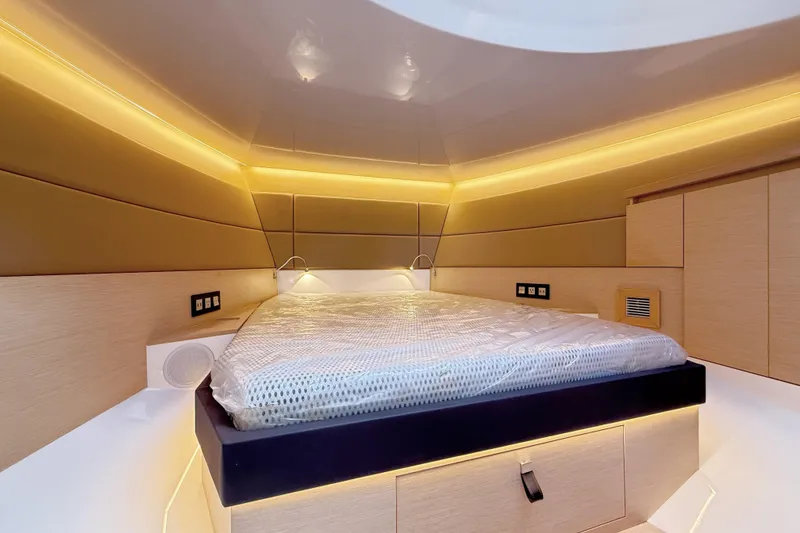 Slide: The Image of Luxurious interior cabin of 2022 Tesoro T38 Outboard with ambient lighting and modern design. - 49