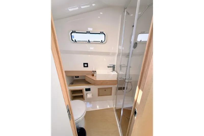 Slide: The Image of Modern bathroom interior of 2022 Tesoro T38 Outboard boat with shower and toilet. - 52