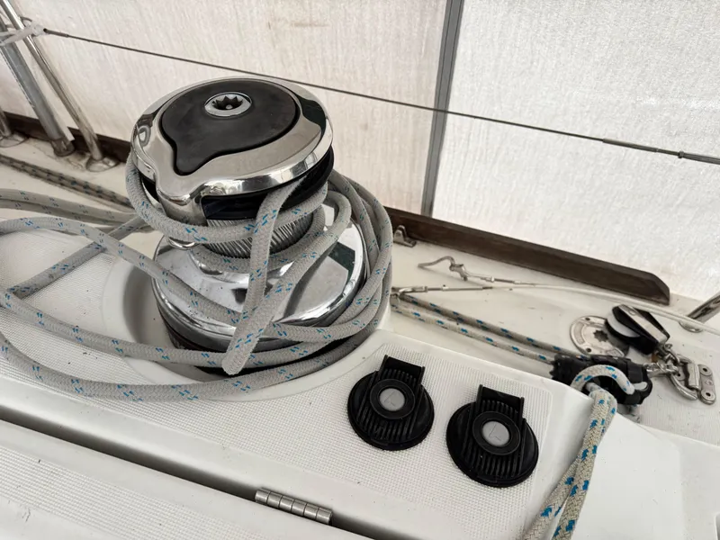 Slide: The Image of Winch and ropes on 2014 Beneteau Oceanis 48 sailboat deck. - 13