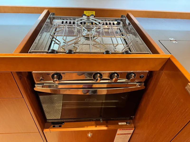 Slide: The Image of Stove and oven in 2014 Beneteau Oceanis 48 yacht kitchen. - 38