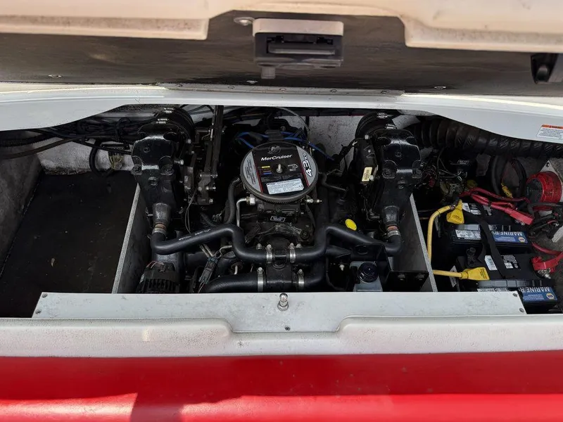 Slide: The Image of Engine compartment of a 2013 Crownline 185 SS boat, featuring a MerCruiser engine. - 3