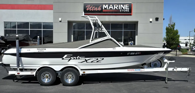 Slide: The Image of 2000 Toyota Epic 22 boat on trailer at Utah Marine Store. - 1