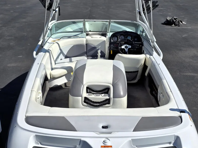 Slide: The Image of 2000 Toyota Epic 22 boat interior with seating and steering wheel, viewed from above. - 13
