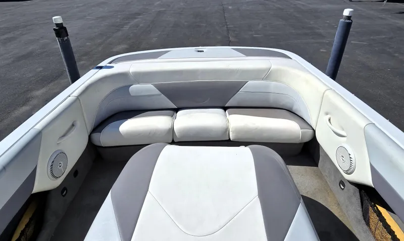 Slide: The Image of Interior of a 2000 Toyota Epic 22 boat with cushioned seating. - 17