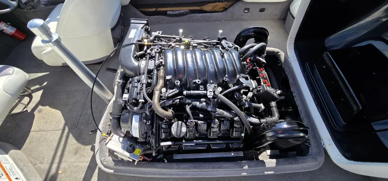 Slide: The Image of Engine of a 2000 Toyota Epic 22 boat, exposed in the interior compartment. - 18