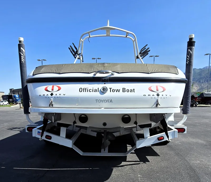Slide: The Image of Rear view of a 2000 Toyota Epic 22 tow boat under clear blue skies. - 4