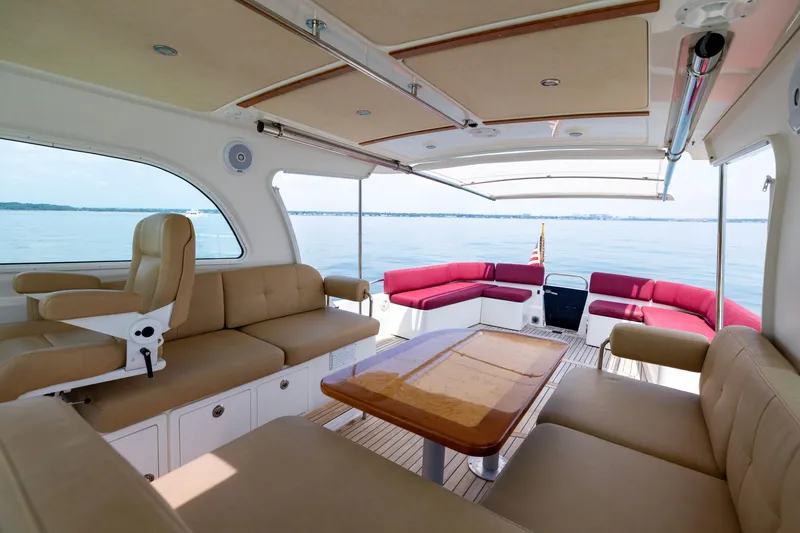 Slide: The Image of Luxurious interior of 2018 Back Cove Downeast 37 yacht with spacious seating and scenic ocean view. - 20
