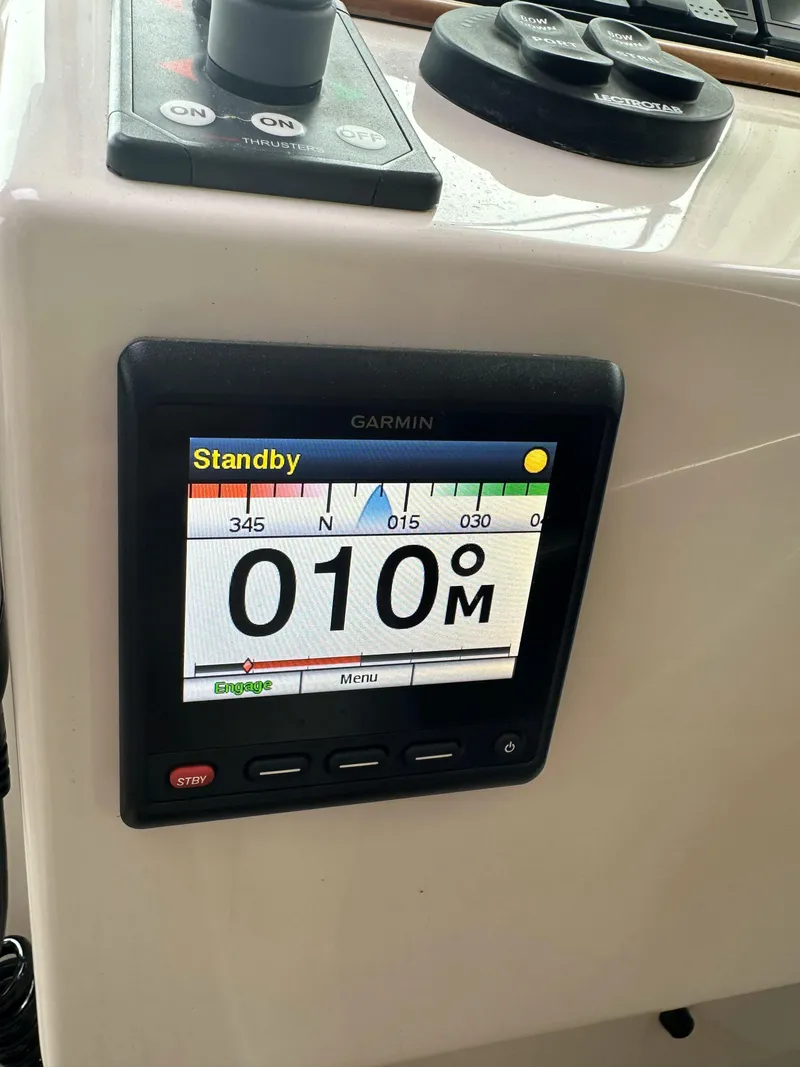 Slide: The Image of Garmin marine display on 2018 Back Cove Downeast 37 boat dashboard. - 31