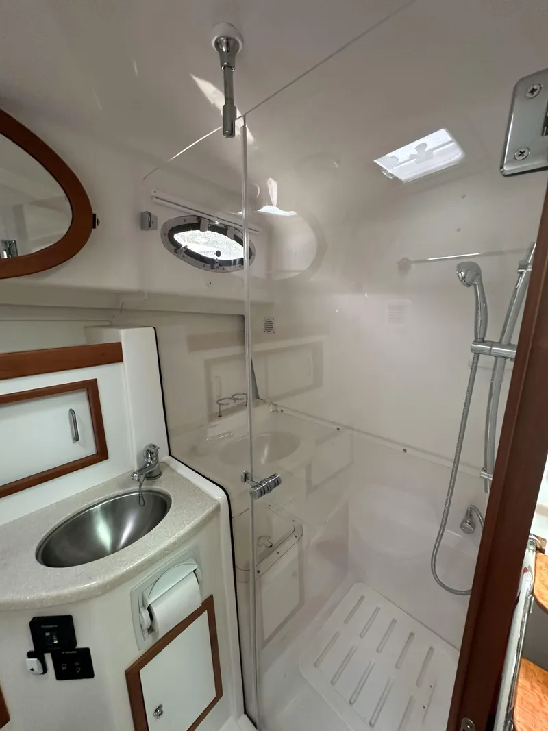 Slide: The Image of 2018 Back Cove Downeast 37 yacht bathroom with modern fixtures and sleek design. - 46