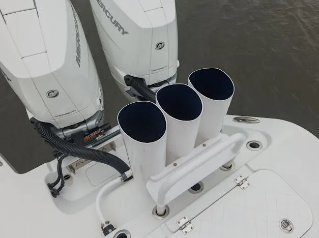 Slide: The Image of 2022 Freeman 47 boat with Mercury outboard engines on a calm river. - 30