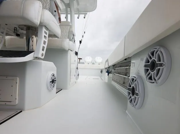 Slide: The Image of Tackle storage compartment on a 2022 Freeman 47 boat, featuring organized fishing gear. - 48