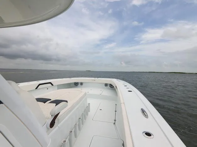 Slide: The Image of Freeman 47 boat with dual livewells and Mercury outboard engines, 2022 model. - 49