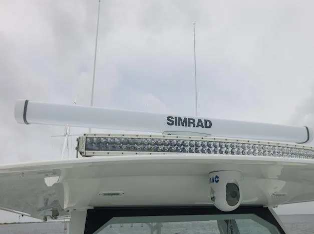 Slide: The Image of Freeman 47 boat with Simrad radar, cloudy sky, 2022 model. - 61