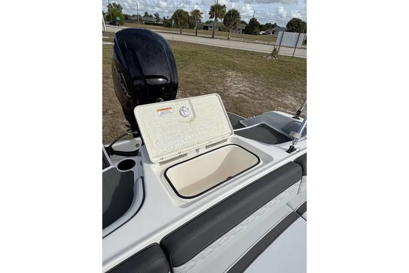 Slide: The Image of 2025 Bayliner Element M17 boat cockpit with steering wheel and control panel. - 11