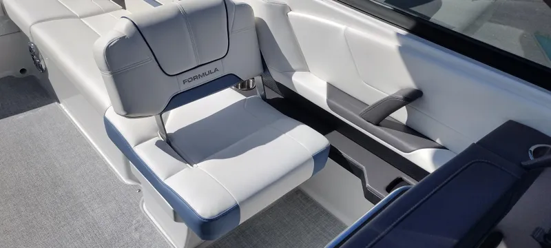 Slide: The Image of 2024 Formula 290 BR boat interior with luxurious seating and modern design. - 18