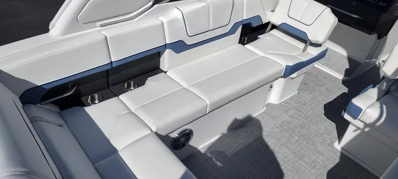 Slide: The Image of 2024 Formula 290 BR boat interior with white seating and modern design. - 20