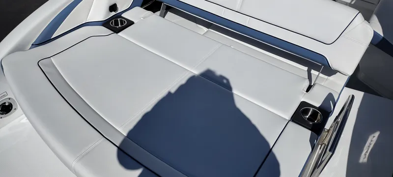 Slide: The Image of 2024 Formula 290 BR boat with sleek white seating and cup holders. - 33