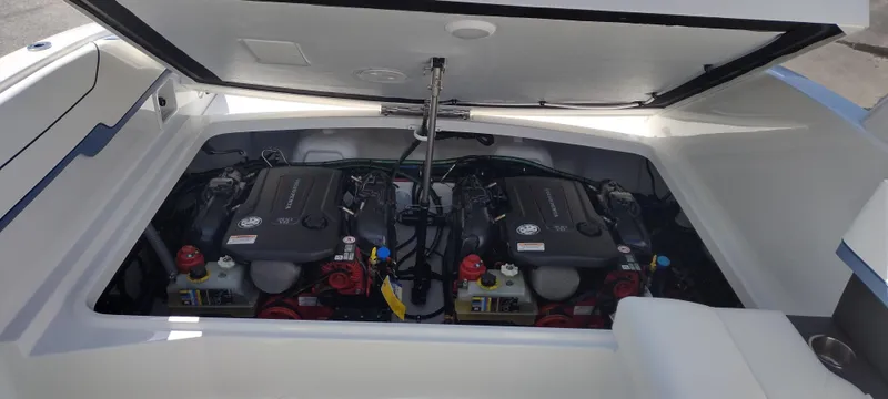 Slide: The Image of 2024 Formula 290 BR boat engine compartment with dual engines visible. - 34