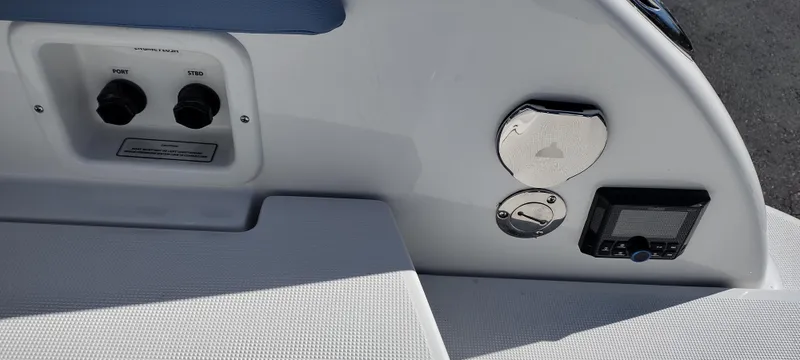Slide: The Image of 2024 Formula 290 BR boat dashboard with controls and speaker. - 47