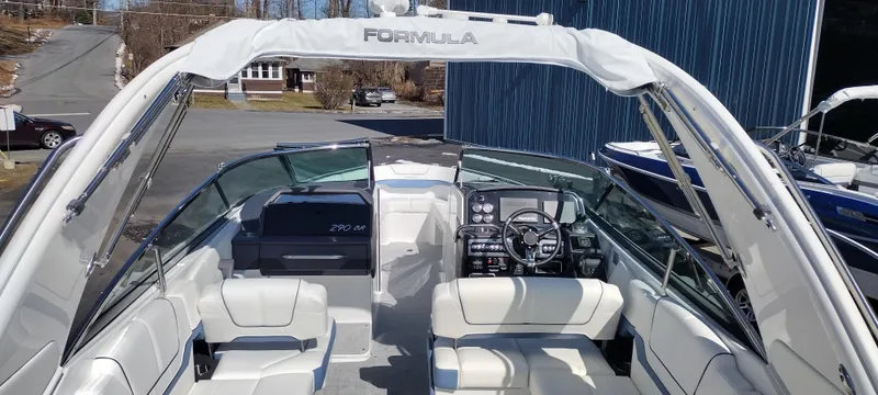 Slide: The Image of 2024 Formula 290 BR boat interior with sleek design and modern dashboard. - 48