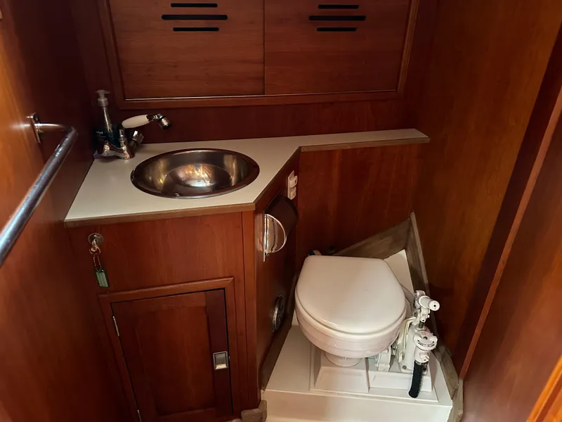Slide: The Image of Hinckley Sou'wester 42 yacht bathroom with sink and marine toilet, 1987 model. - 31