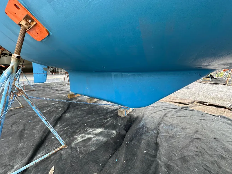 Slide: The Image of 1987 Hinckley Sou'wester 42 sailboat hull on stands, blue finish. - 33