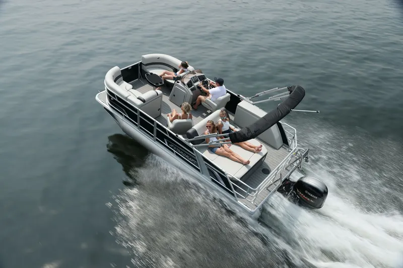 Slide: The Image of Starcraft EX 20 boat 2026 on water with passengers. - 2