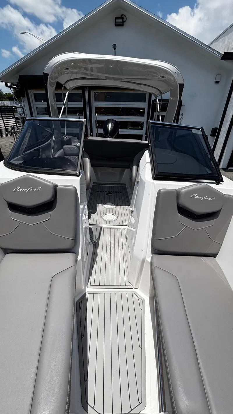 Slide: The Image of 2025 Ventura V250 Comfort boat interior with sleek seating and modern design. - 7