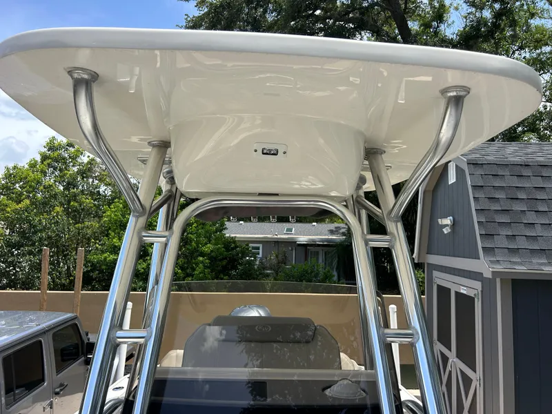 Slide: The Image of 2023 Key West 239 FS boat with T-top and stainless steel supports. - 13