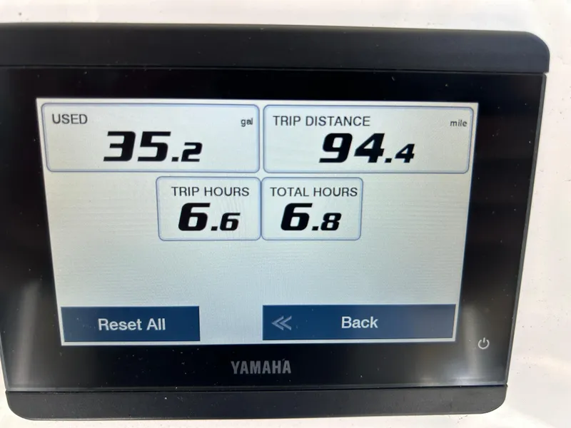 Slide: The Image of Yamaha display showing fuel usage, trip distance, and hours for Key West 239 FS boat. - 18