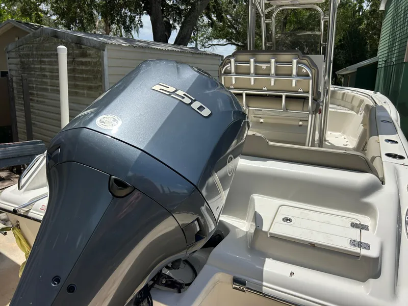 Slide: The Image of 2023 Key West 239 FS boat with powerful 250 engine, sleek design, and spacious deck. - 7