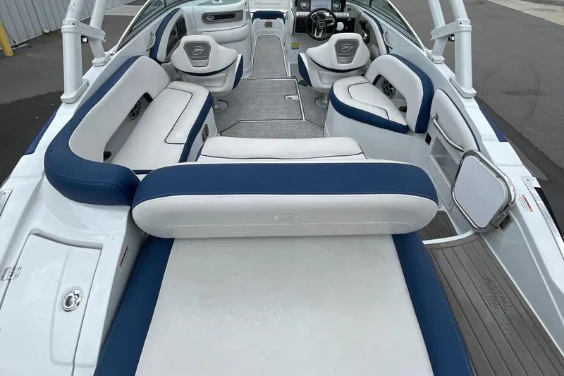 Slide: The Image of 2023 Crownline E235 boat interior with spacious seating and modern design. - 10