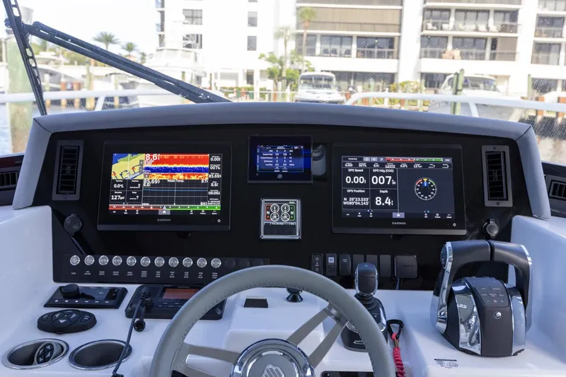 Slide: The Image of 2023 ArrowCat Flybridge Dual Helm with advanced navigation displays and controls. - 36