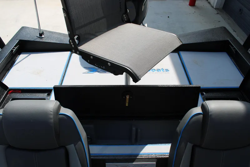 Slide: The Image of 2026 Xpress H18C Crappie boat interior with seating and storage compartments. - 11