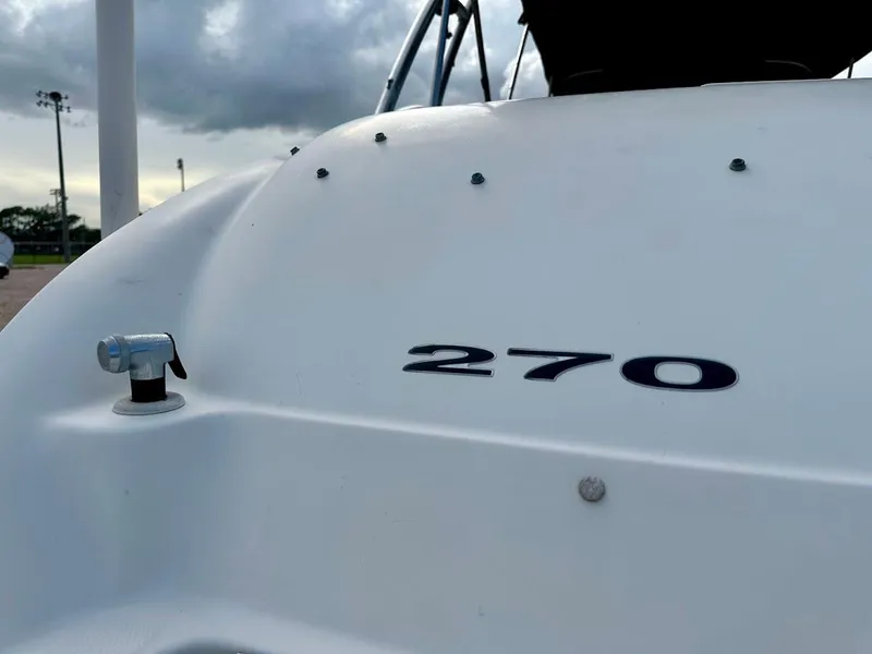 Slide: The Image of Close-up of 2004 Sea Ray SUNDECK 270 boat with visible model number. - 17