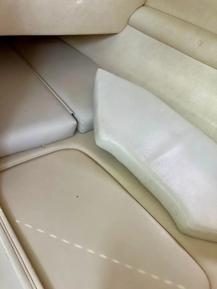 Slide: The Image of 2004 Sea Ray SUNDECK 270 interior seating, beige upholstery, comfortable design. - 36