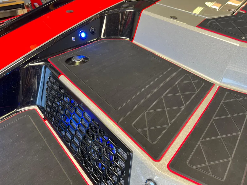 Slide: The Image of 2023 Daves Custom Boats M37R interior with sleek black and red detailing. - 13